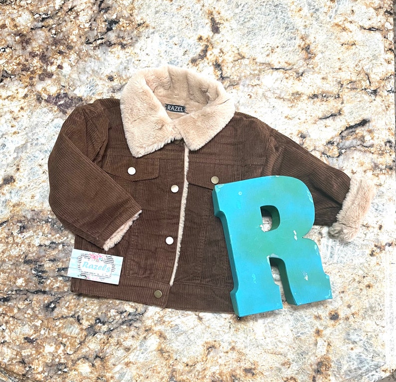 Kids Western Corduroy Coats with very soft and warm Sherpa lining. Available in pink, yellow and brown.