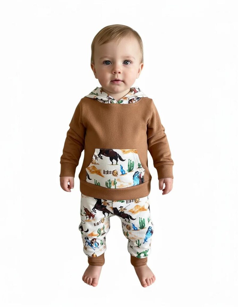 Conjunto vaquero para niño: sudadera con capucha y pantalón deportivo. imagen 7