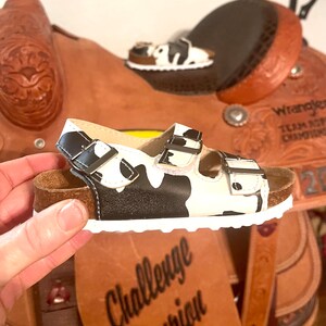 outwoods cow print sandals