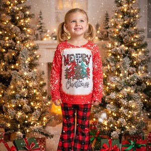 girls christmas outfits featuring red and black checkered buffalo plaid trouser pants and your choice of Merry Christmas or It's the Most Wonderful Time of the Year Long Sleeve Shirts