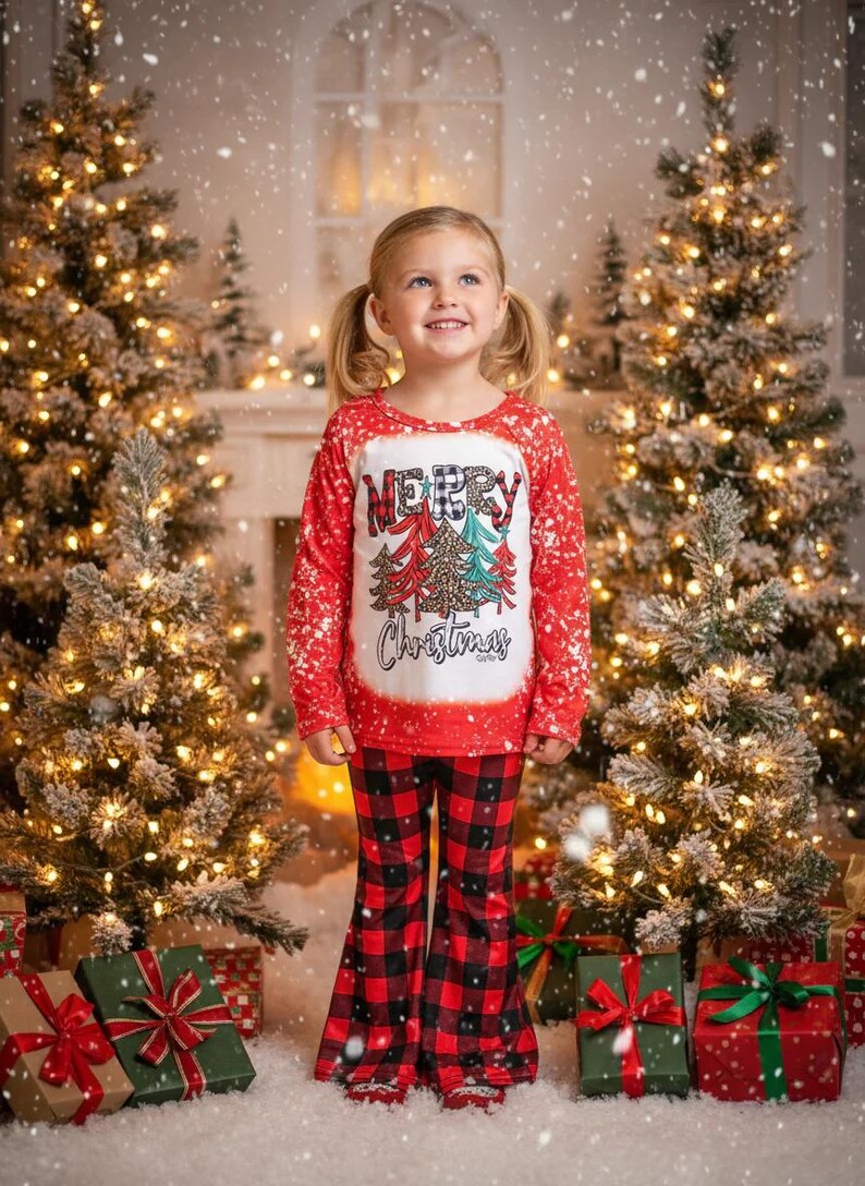 girls christmas outfits featuring red and black checkered buffalo plaid trouser pants and your choice of Merry Christmas or It's the Most Wonderful Time of the Year Long Sleeve Shirts