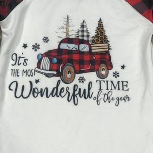 girls christmas outfits featuring red and black checkered buffalo plaid trouser pants and your choice of Merry Christmas or It's the Most Wonderful Time of the Year Long Sleeve Shirts