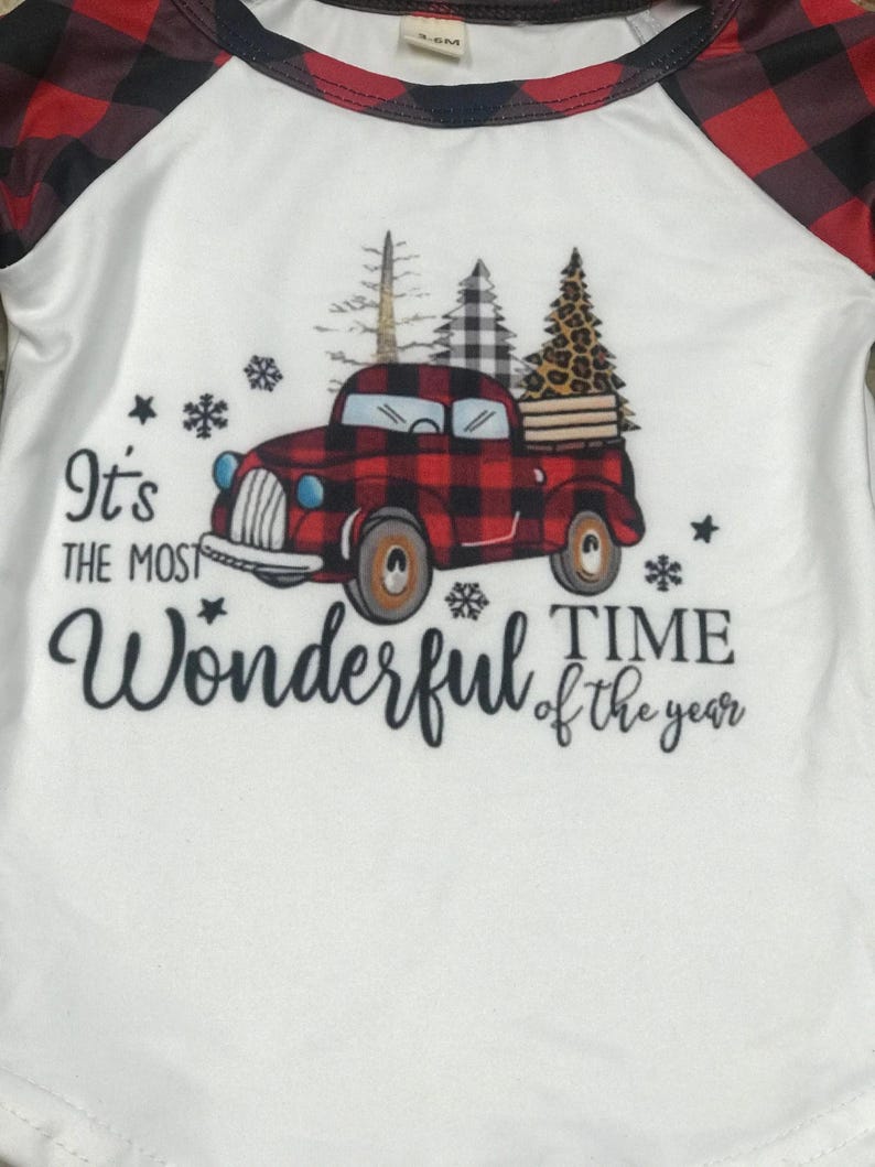 girls christmas outfits featuring red and black checkered buffalo plaid trouser pants and your choice of Merry Christmas or It's the Most Wonderful Time of the Year Long Sleeve Shirts
