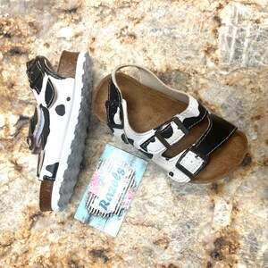 outwoods cow print sandals