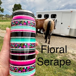 16 oz Stainless Steel Tumblers | Western Tumblers Feature temperature control - keep your beverage hot or cold. Sleek design fits everywhere! Choose from 4 designs: Pink Cowgirl, Serape Bolts, Yeehaw & Floral Serape. Ships FREE with $35+ purchase.