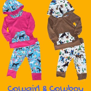 Little Cowboy Outfit. This boys' Western jogger set features a retro cowboy design, soft hoodie with kangaroo pocket, and cozy jogger pants. Made from a comfy cotton/spandex blend. Makes a great Cowboy Baby Shower gift or Cowboy Birthday Outfit.