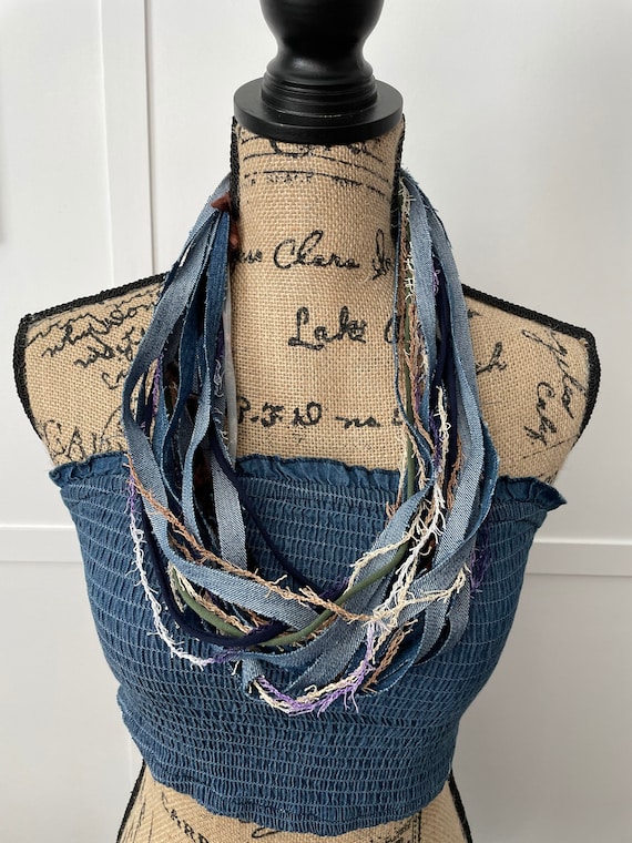 An embroidered eye talisman I made from scrap denim, stuffed with scrap  threads from other projects. : r/WitchesVsPatriarchy