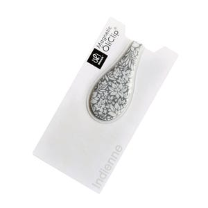 May include: A white and gray magnetic oil clip with a floral pattern. The clip is labeled "Magnetic OilClip" and "oli block."
