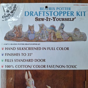 May include: A Beatrix Potter Draftstopper Kit with the text "Sew-It-Yourself". The draftstopper is hand silkscreened in full color and finishes to 35 inches. The kit fills a standard door and is made of 100% cotton.
