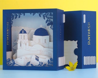 Santorin, Grèce. Oeuvre d'art miniature en papier kirigami. Cadeaux grecs, architecture insulaire. Cadeau d'anniversaire pour elle, lui. Décoration artistique romantique