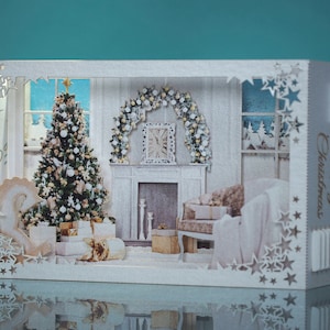 Christmas Livingroom house. Paper pop-up box. Christmas tree, fireplace, armchair. Laser cut 3d kirigami. Happy New Year. Winter snow window