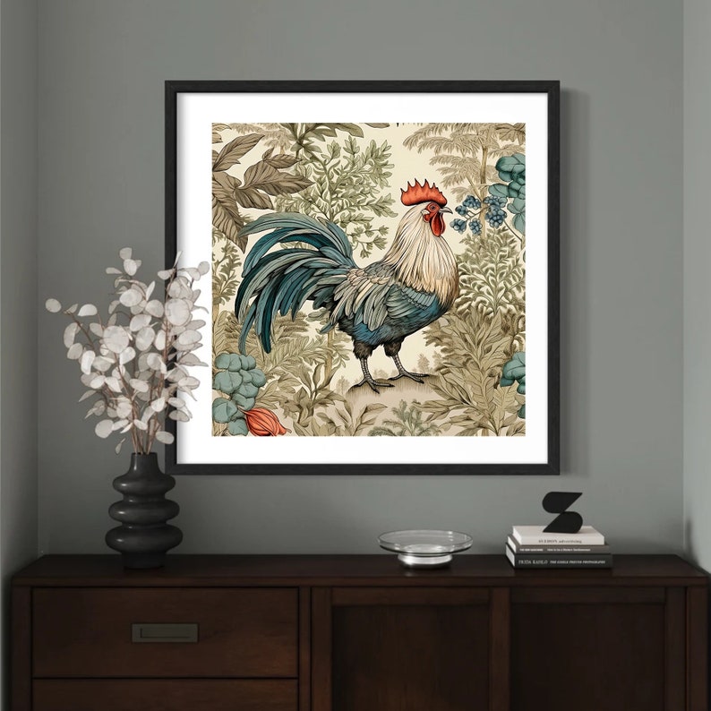 May include: A framed illustration of a rooster standing in a lush garden with green and brown foliage. The rooster has a red comb and wattle, blue and gray feathers, and a yellow beak.