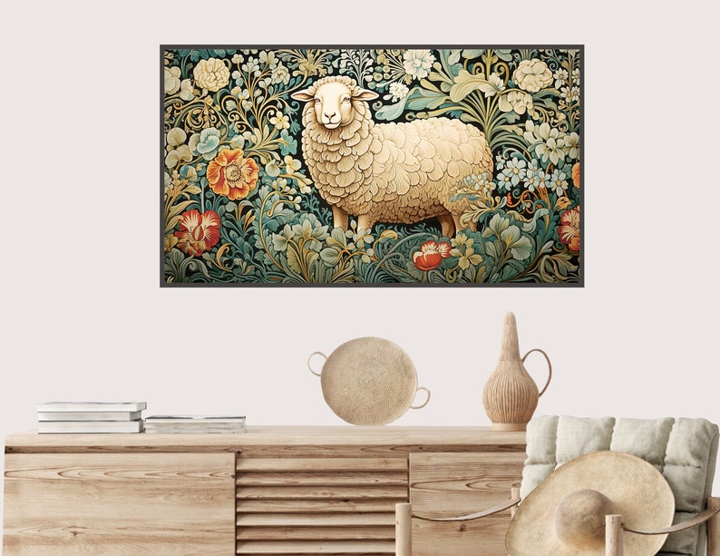 May include: A framed tapestry featuring a white sheep standing in a field of colorful flowers. The tapestry has a dark green background and intricate floral designs.