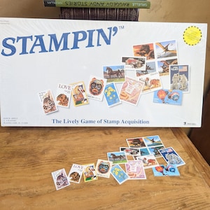 Stampin&#39; USPS Board Game & Vintage Stamps Featured on the Cover of the Game, Box Measures 18.5x9.5x1.5 Inches, 5.48 in Vintage Stamps
