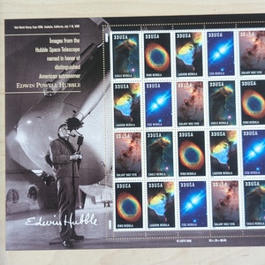 May include: A sheet of 20 US postage stamps featuring images from the Hubble Space Telescope. The stamps are arranged in a 5x4 grid and each stamp features a different nebula. The stamps are all 33 cents and are from the year 2000. The text "Images from the Hubble Space Telescope" is printed at the top of the sheet. The text "Edwin Powell Hubble" is printed at the bottom of the sheet.