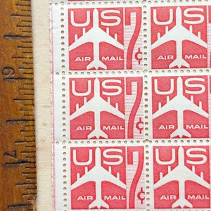 Hoja de 100 sellos de correo aéreo rojos, 7 centavos, 1960, sellos postales sin usar