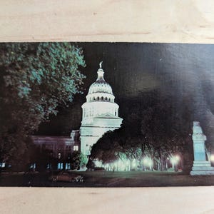 Vista notturna inutilizzata della cartolina dello State Capitol, Austin, Texas