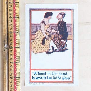 Carte postale « Une main dans la main vaut deux gants » inutilisée