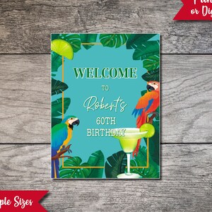 May include: A tropical-themed welcome sign with parrots and a margarita glass. The sign says "Welcome to Robert's 60th Birthday".