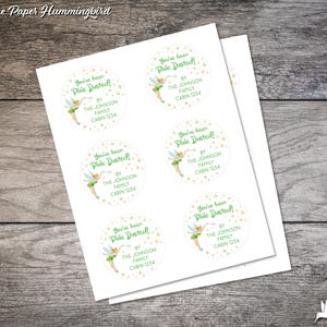 May include: Six round stickers featuring a green fairy character holding a wand against a gold star background. The text on the stickers reads "You've been Pixie Dusted!" with the words "By The Johnson Family Cabin 1234" underneath.