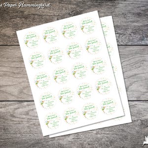 May include: A sheet of white sticker paper with 24 round stickers featuring a green fairy with a yellow dress and gold glitter. The stickers say "You've been dusted! By The Johnson Family Cabin 1234".