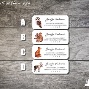 May include: Four different return address labels with woodland animal illustrations. The labels feature an owl, a squirrel, a fox, and a reindeer. Each label has the text "Jennifer Anderson", "1001 North Main Street", "Springfield, Massachusetts", and "1 2 3 4 5".