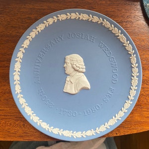 Josiah Wedgwood with embossed lettering which reads “250th Anniversary 6 1/2” plate