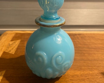 Powder Blue Vintage Avon Bottle with gold rim 5 1/2”H x 4”