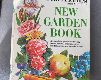 May include: A vintage Better Homes and Gardens New Garden Book with a colorful illustration of flowers, fruits, and vegetables on the cover.