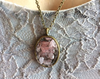 Rose Quartz and clear crystal oval bronze pendant on bronze chain necklace