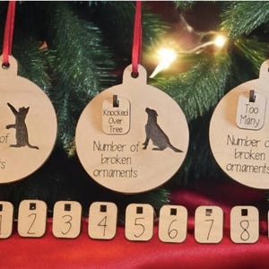 Number of Broken ornaments Cat  Dog Child Christmas Ornament