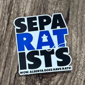 May include: A sticker featuring the word "SEPARATISTS" in black and blue block letters. The word "RAT" is in blue, with a small rat illustration. The text "WOW, ALBERTA DOES HAVE RATS!" is at the bottom.
