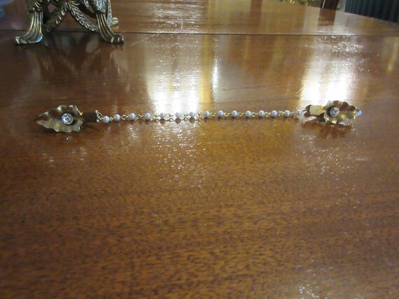 RHINESTONE SWEATER GUARD