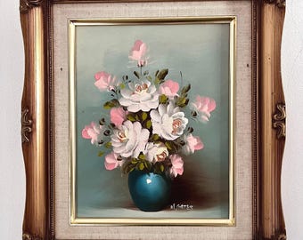 Cuadro al óleo floral vintage: rosas rosas y blancas en marco dorado.