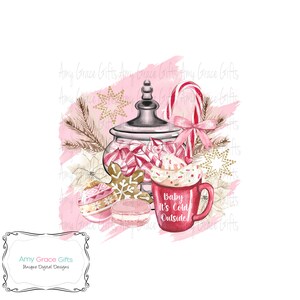 May include: A watercolor illustration of a pink and white winter scene with a red mug that says "Baby It's Cold Outside", a jar of candy canes, a gingerbread cookie, a macaron, and a candy cane.