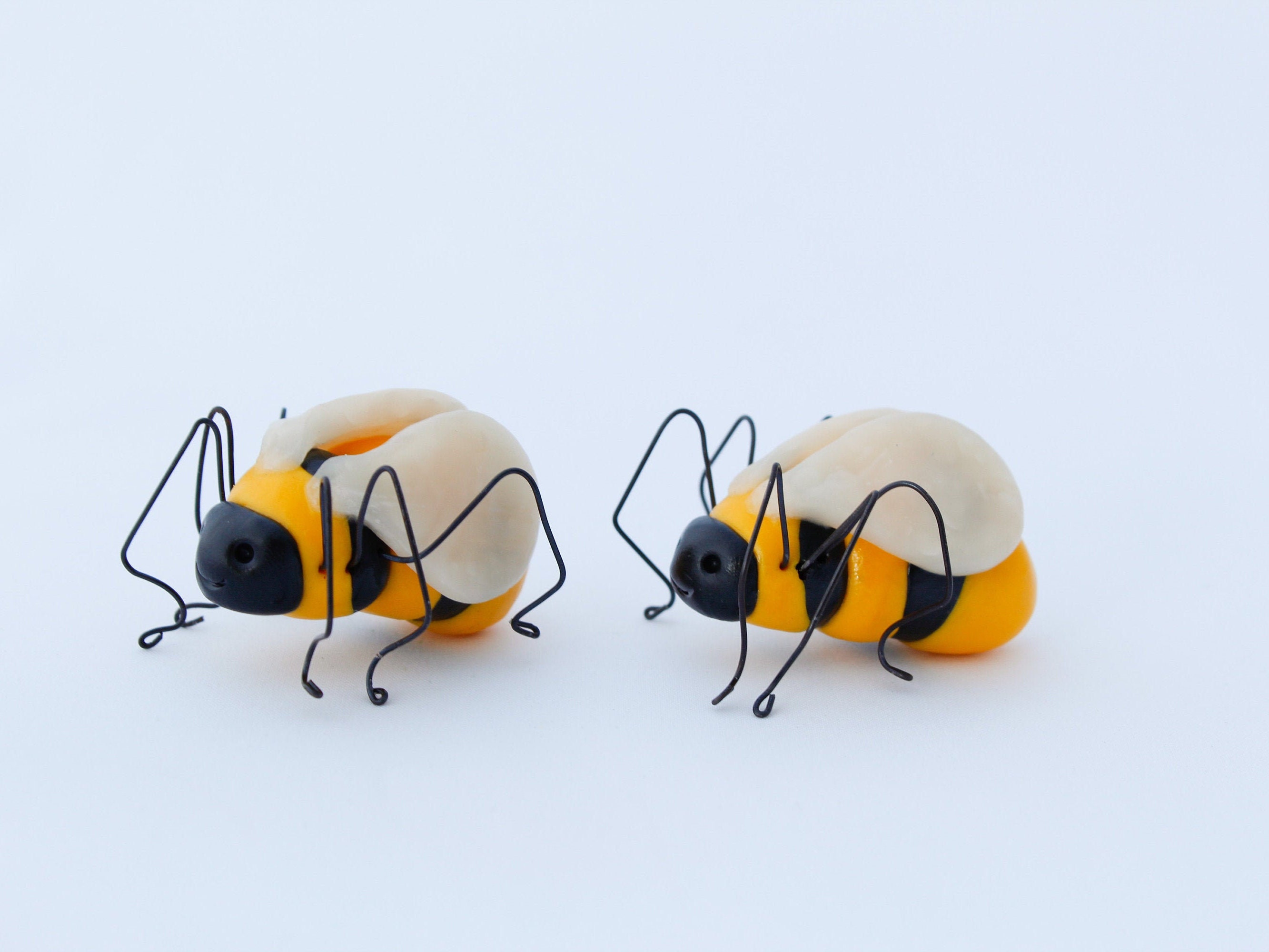 Realistic bee decor, busy honeybee miniature figurine, plant