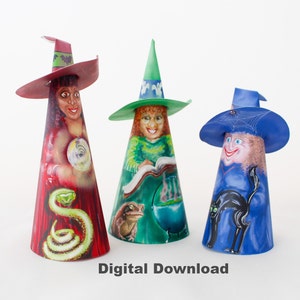 May include: Three cone-shaped witch figures with different colored hats and outfits. The witch on the left is wearing a red hat and dress with a green snake. The witch in the middle is wearing a green hat and dress with a frog and a cauldron. The witch on the right is wearing a blue hat and dress with a black cat.