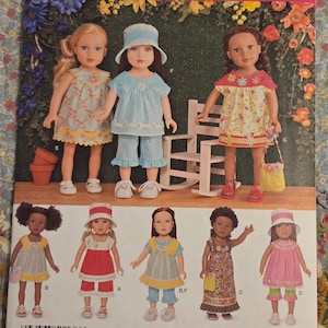 May include: A Simplicity 1136 sewing pattern envelope for 18-inch doll clothes. The front displays various dolls wearing dresses, hats, and pants in floral and checkered fabrics. Text includes Simplicity 1136, U.S. One Size, and Doll Clothes.
