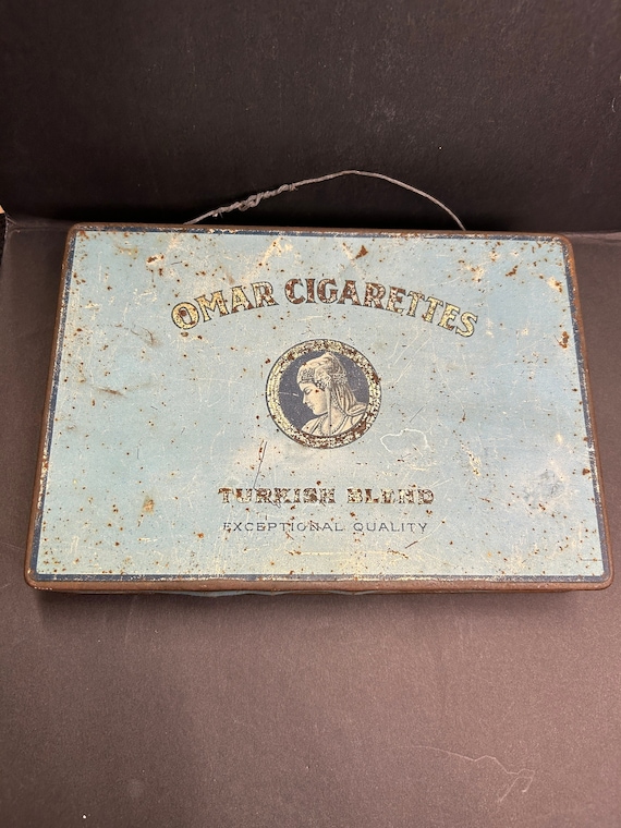 turkish cigarettes 1920's Omar Cigarettes Turkish Blend Exceptional Quality Light Blue Tin  With Wire Handle