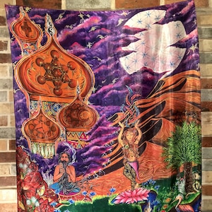 May include: A colorful tapestry with a psychedelic design featuring a meditating figure, a dancing figure, and a large, ornate dome structure. The tapestry is set against a backdrop of a starry night sky with a large, white moon.