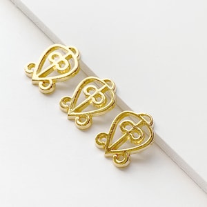 Set of 10- 18K Gold Plated Odo Nnyew Fie Kwan Charms