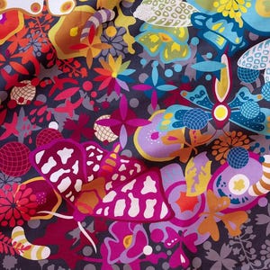 May include: Fabric featuring a vibrant pattern of butterflies, flowers, and abstract shapes in purple, orange, yellow, and blue hues. The background is a dark grey.