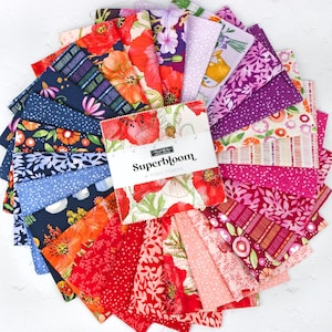 May include: A collection of fabric squares in various floral patterns and colors, including red poppies, purple flowers, and blue designs. The fabric is arranged in a circular pattern, with a label that reads "Superbloom."
