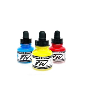 May include: Three bottles of Daler Rowney FW acrylic ink. The bottles are labeled with the brand name and the color of the ink. The colors are Process Cyan, Process Yellow, and Process Magenta.