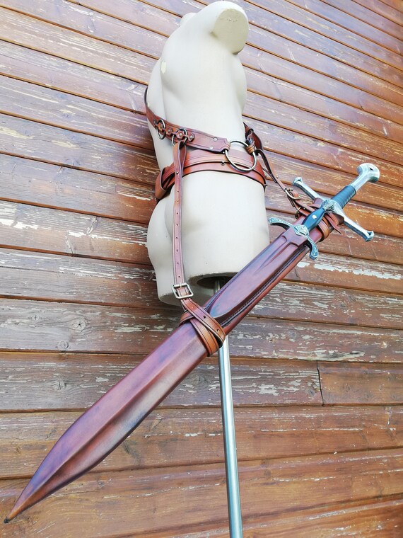 Difference between scabbard and sheath shiprts