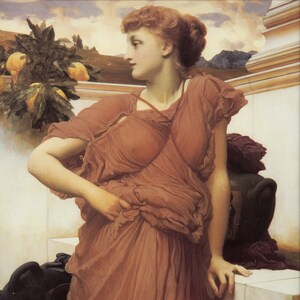 May include: A woman in a flowing, rust-colored gown stands on a stone terrace. She has red hair and is looking off to the side. There are lemons and a leafy branch in the background.