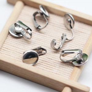 20 Stück Ohrringclips - Edelstahl Nicht durchbohrte Clip Zurück Clip Auf Ohrringe 6-20mm Blank Bases Einstellungen Tablett Cabochon für DIY Ohrring machen