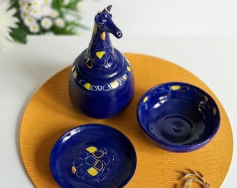 Giraffe themed set of tableware; sugar bowl with lid; plate and bowl; stoneware blue and gold set