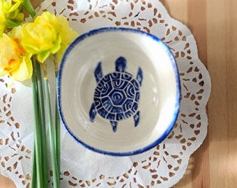 Sgraffito blue tortoise bowl; ceramic serving bowl