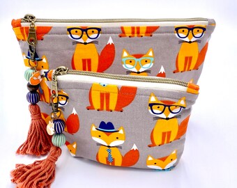 Sassy Fox Cosmetic, School, or Travel Bag with Beaded Charm Tassel.  Easy-glide Zipper, Fully Lined, Softly Padded. 2 Sizes Available.